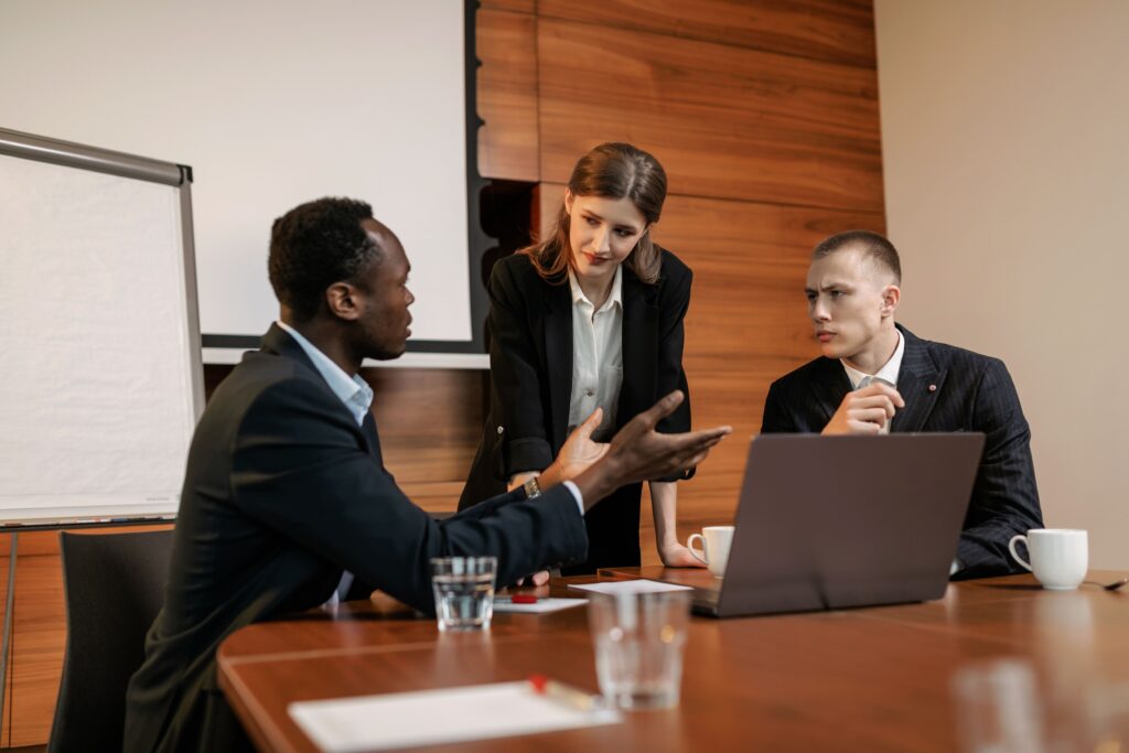 The marketing team is analyzing data and planning digital media buying campaigns across digital platforms.