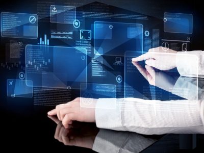 Supply path optimization concept with hands navigating a holographic interface of programmatic data panels and charts