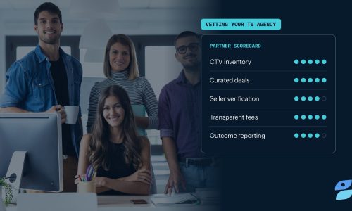 A smiling marketing team next to a partner scorecard, illustrating how to choose a TV ad agency.